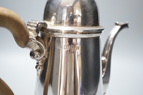 A 1970's 18th century style silver coffee pot, Bryan Savage, London, 1973, 24.5cm, gross 25oz.